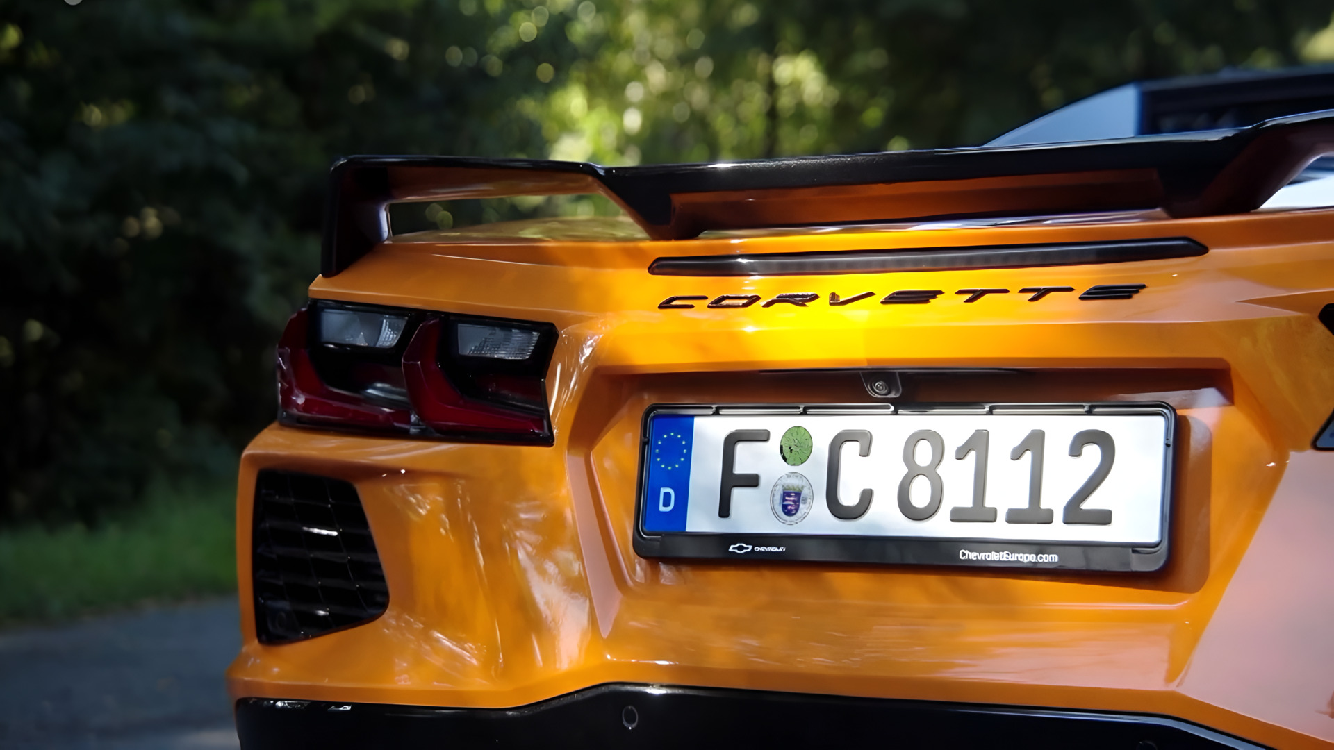 Compact hatchback versus exotic sports car